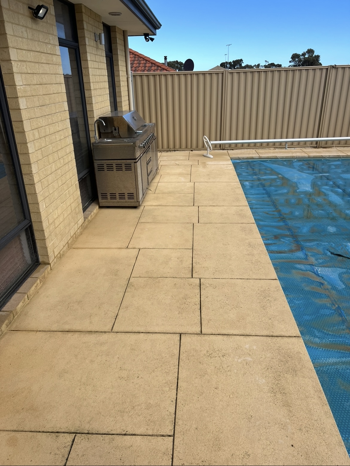 Liquid limestone Liquid limestone pool area after — pressure cleaning Darch Perth WA