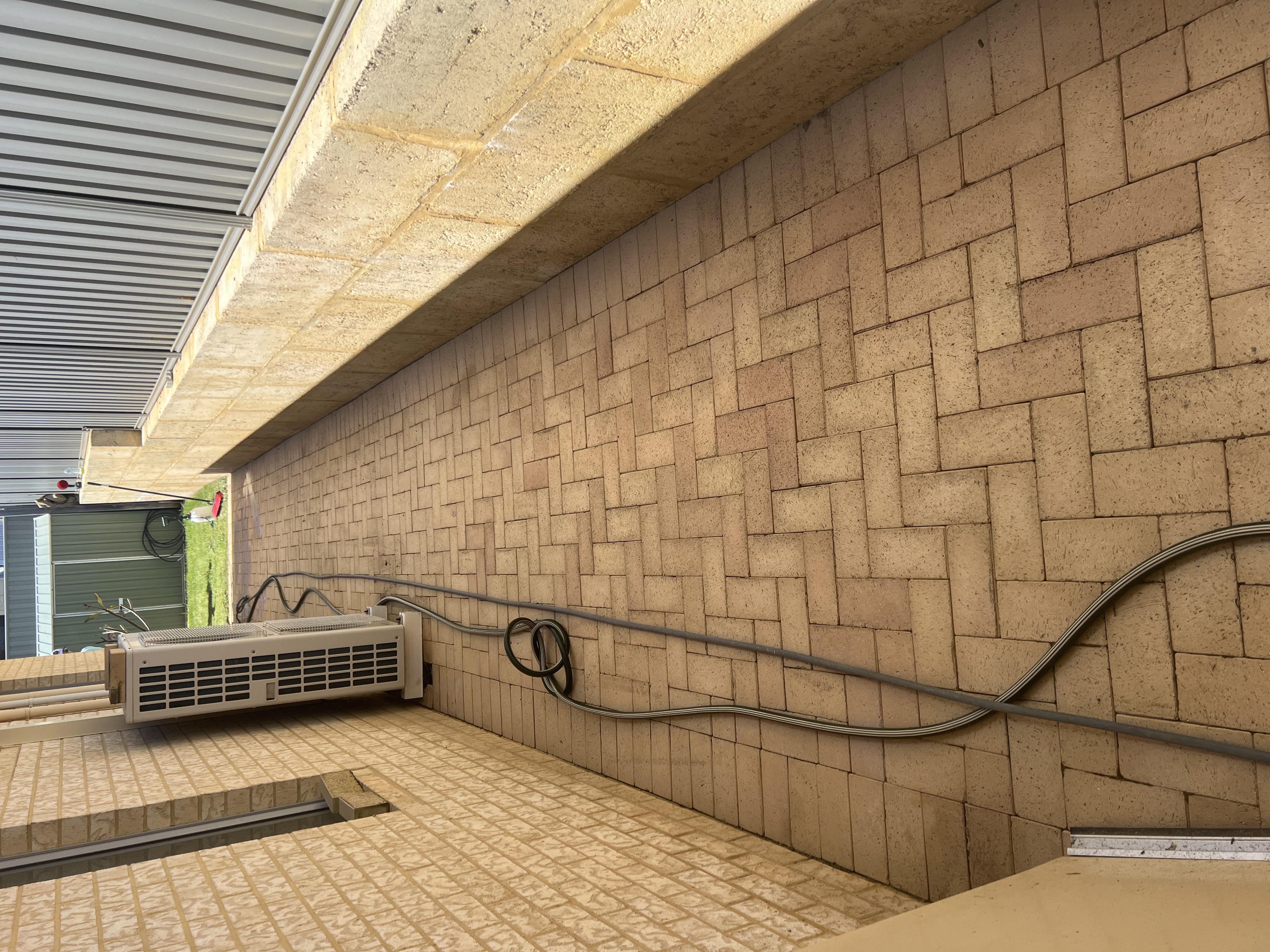 Brick pavers Brick paver side passage after — pressure cleaning Tapping Perth WA