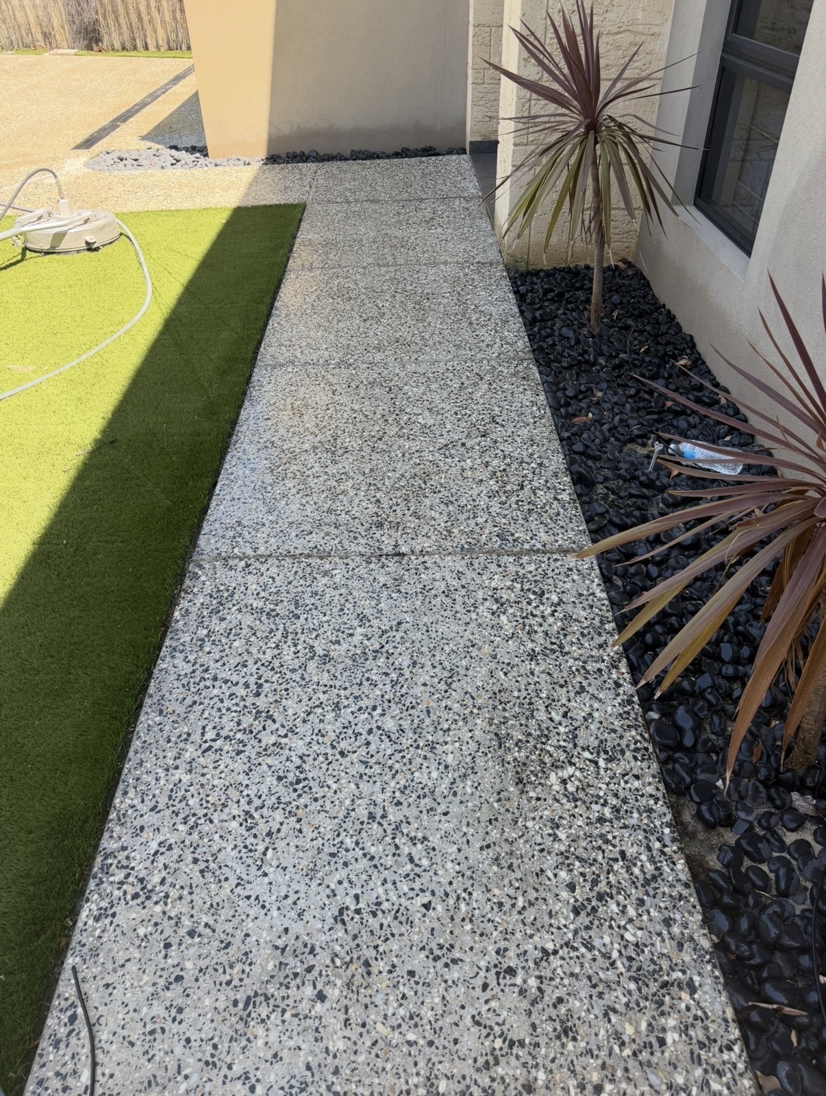 Exposed aggregate Exposed aggregate pathway after — pressure cleaning Yokine Perth WA