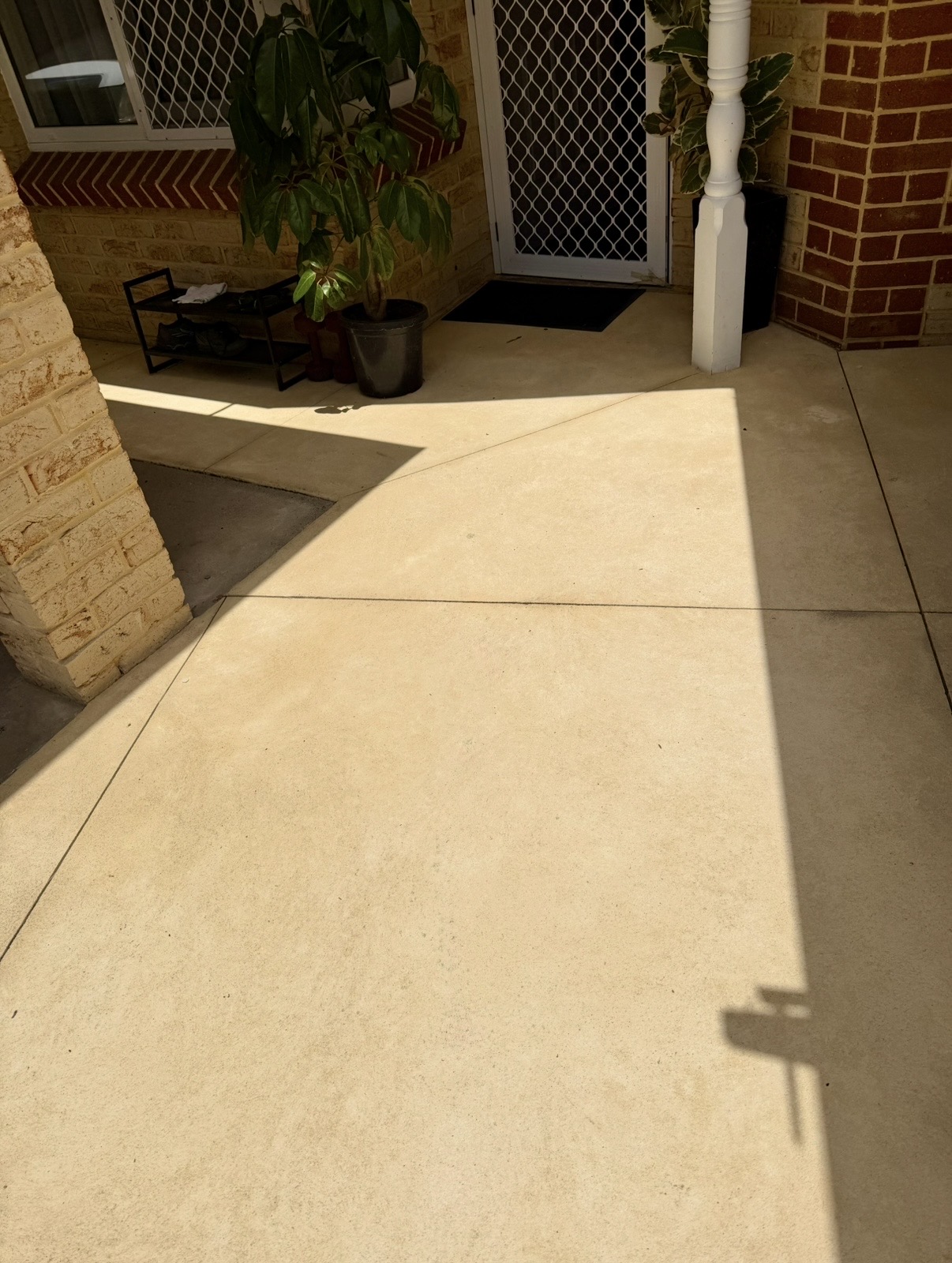 Liquid limestone Concrete front porch after — pressure cleaning North Perth Perth WA