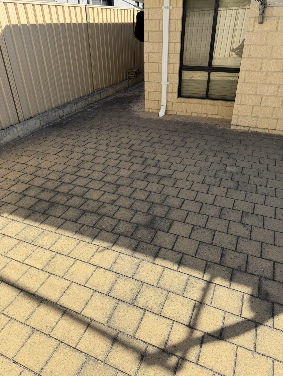 Brick pavers Courtyard brick pavers before — pressure cleaning Padbury Perth WA