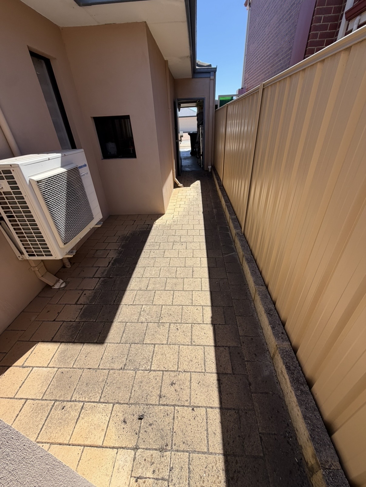 Brick pavers Commercial side passage pavers before — pressure cleaning Innaloo Perth WA