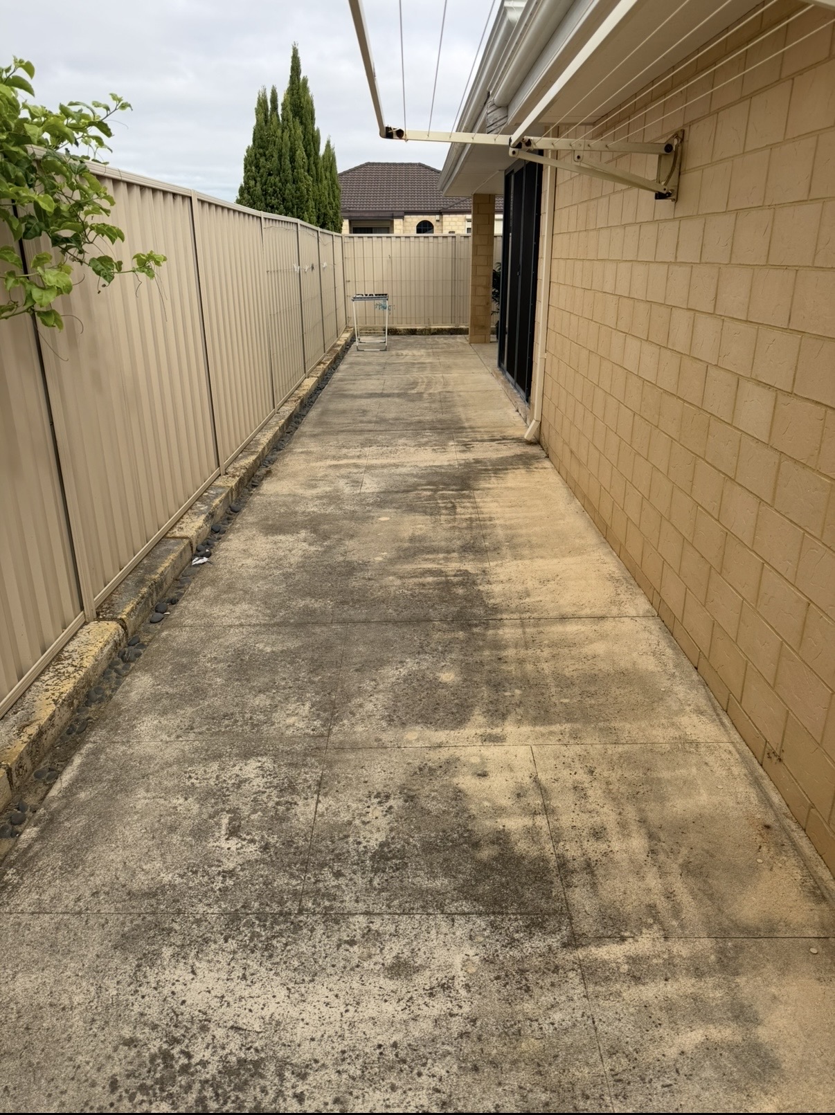 Liquid limestone Concrete side passage after — pressure cleaning Butler Perth WA