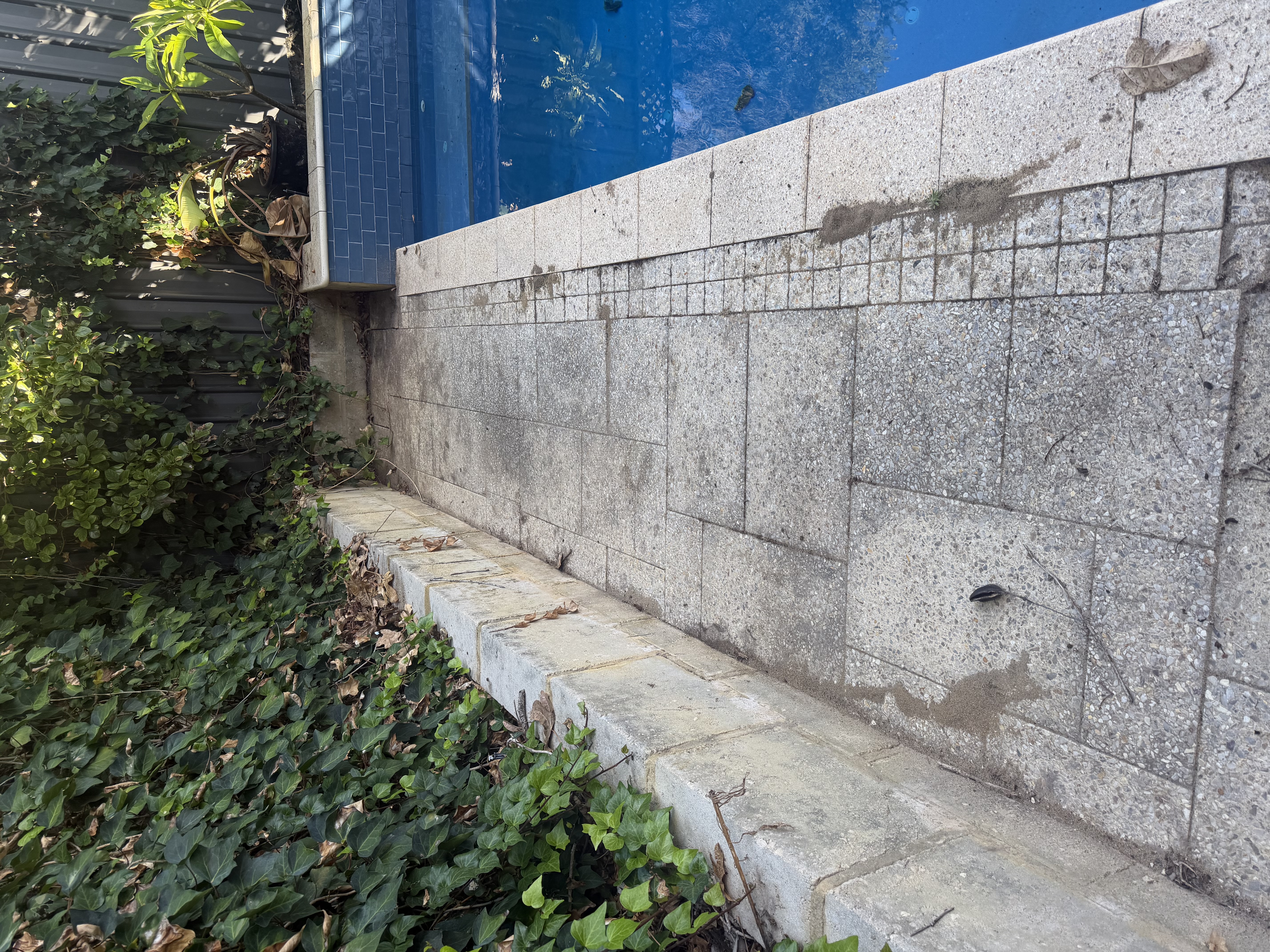 Granite pavers Pool surround aggregate pavers before — pressure cleaning Nedlands Perth WA