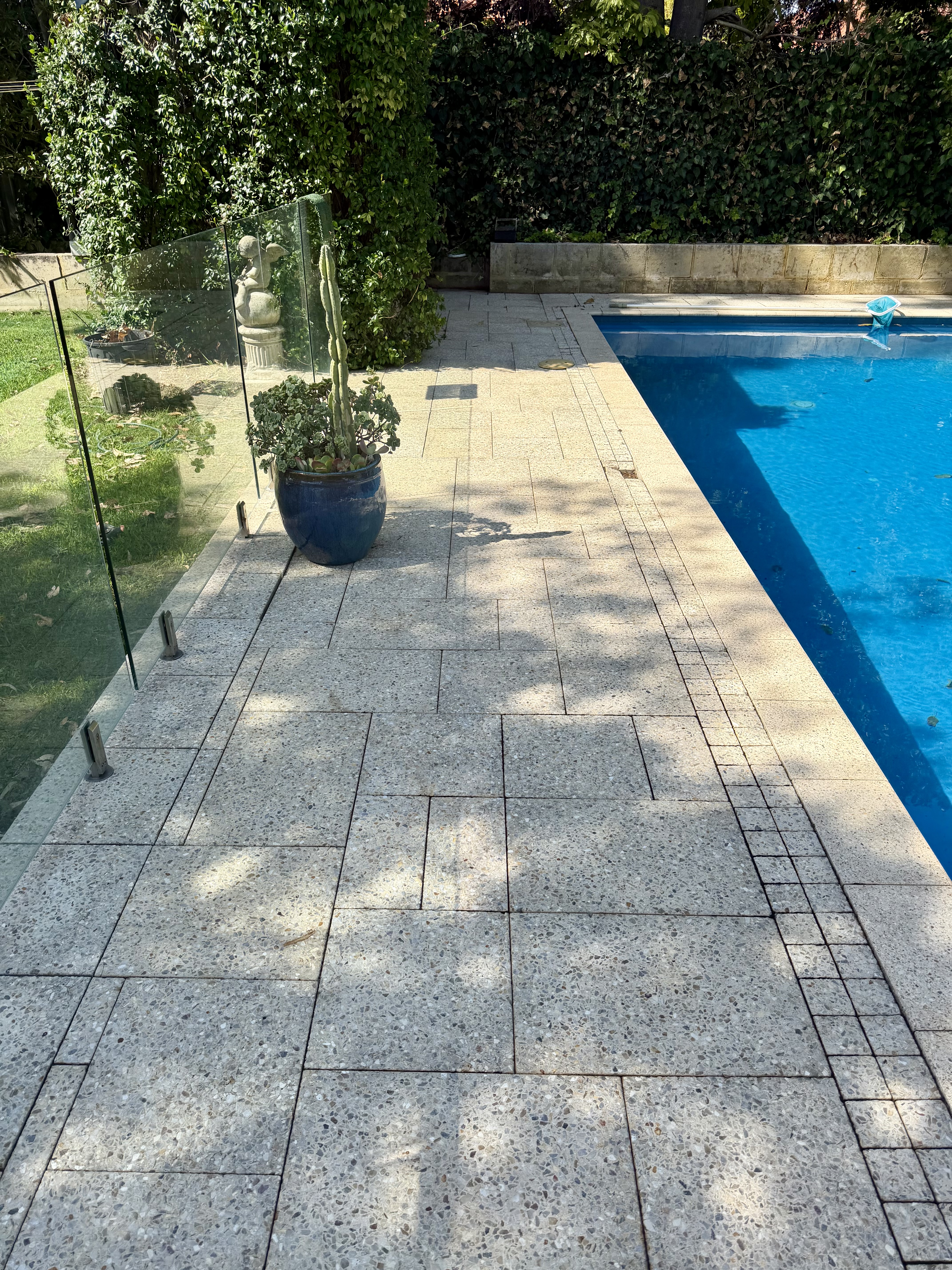 Exposed aggregate Pool surround granite pavers after — pressure cleaning Nedlands Perth WA