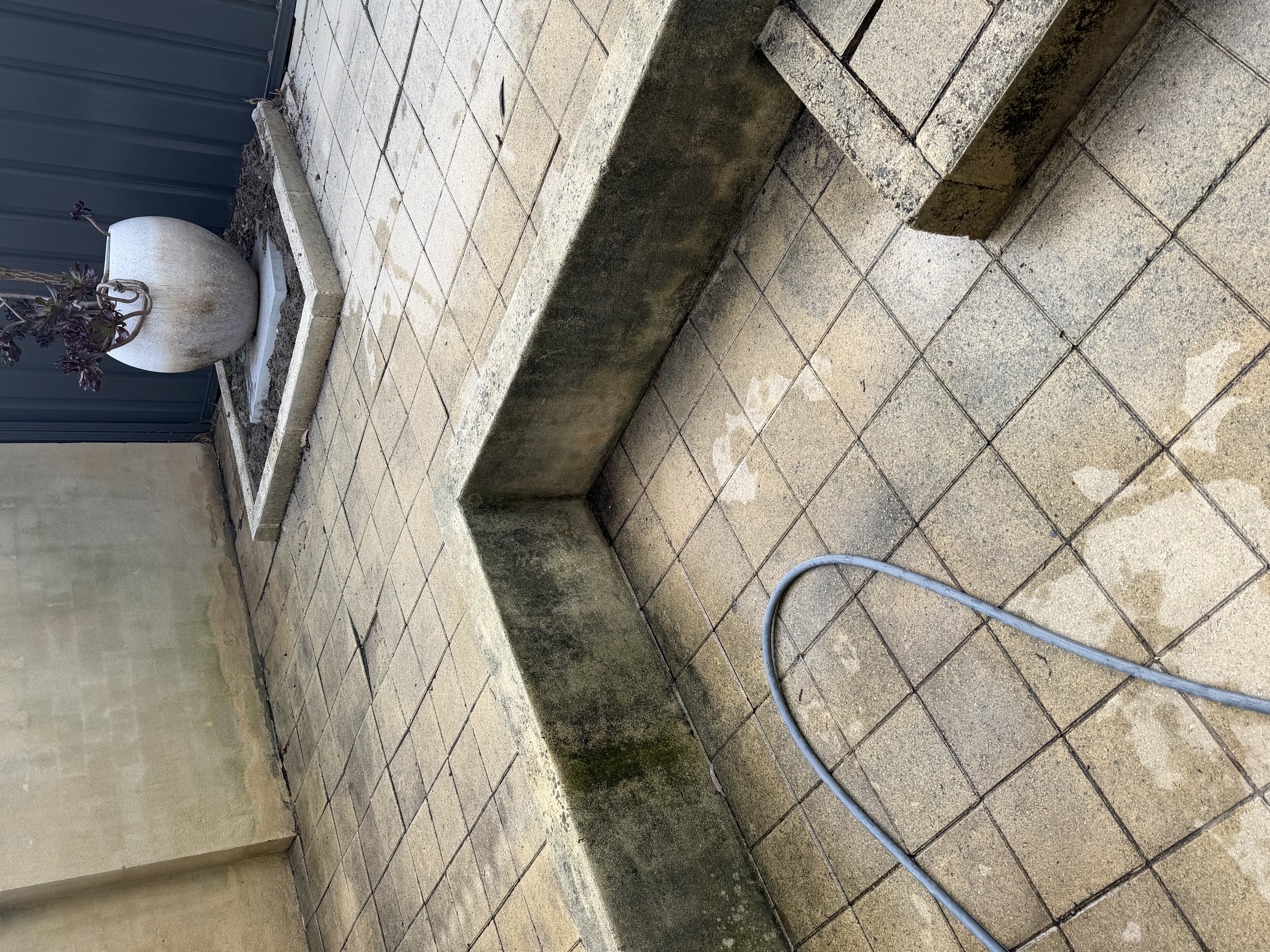Rendered wall Courtyard paver area with steps before — pressure cleaning North Perth Perth WA
