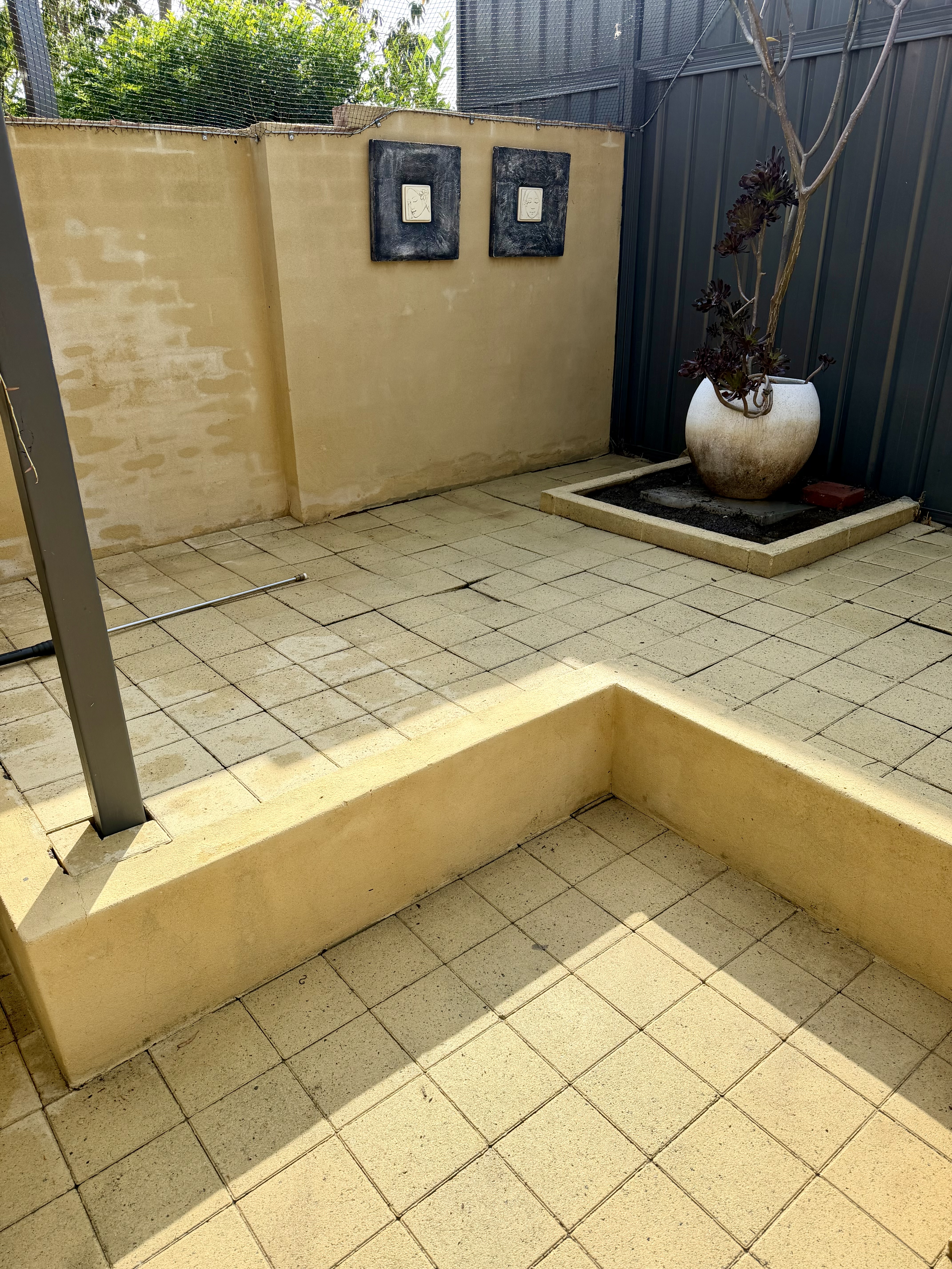 Rendered wall Courtyard paver area with steps after — pressure cleaning North Perth Perth WA