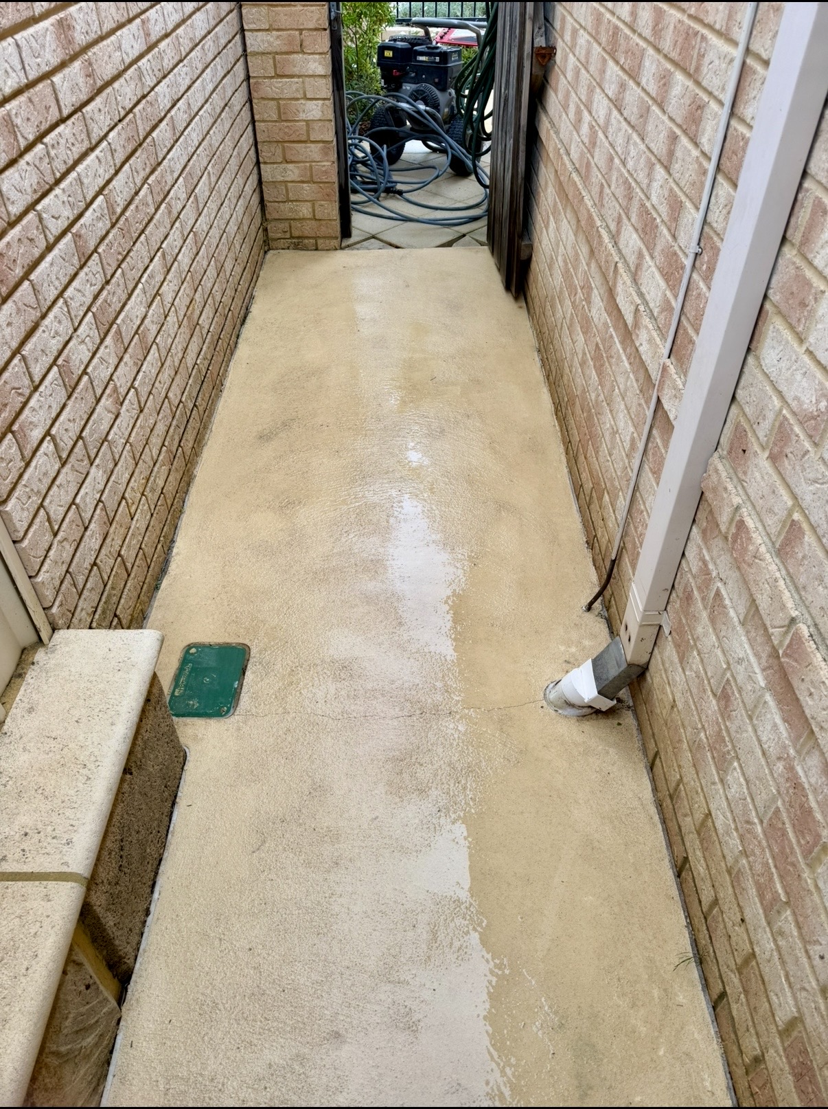 Liquid limestone Concrete narrow passage after — pressure cleaning Joondalup Perth WA