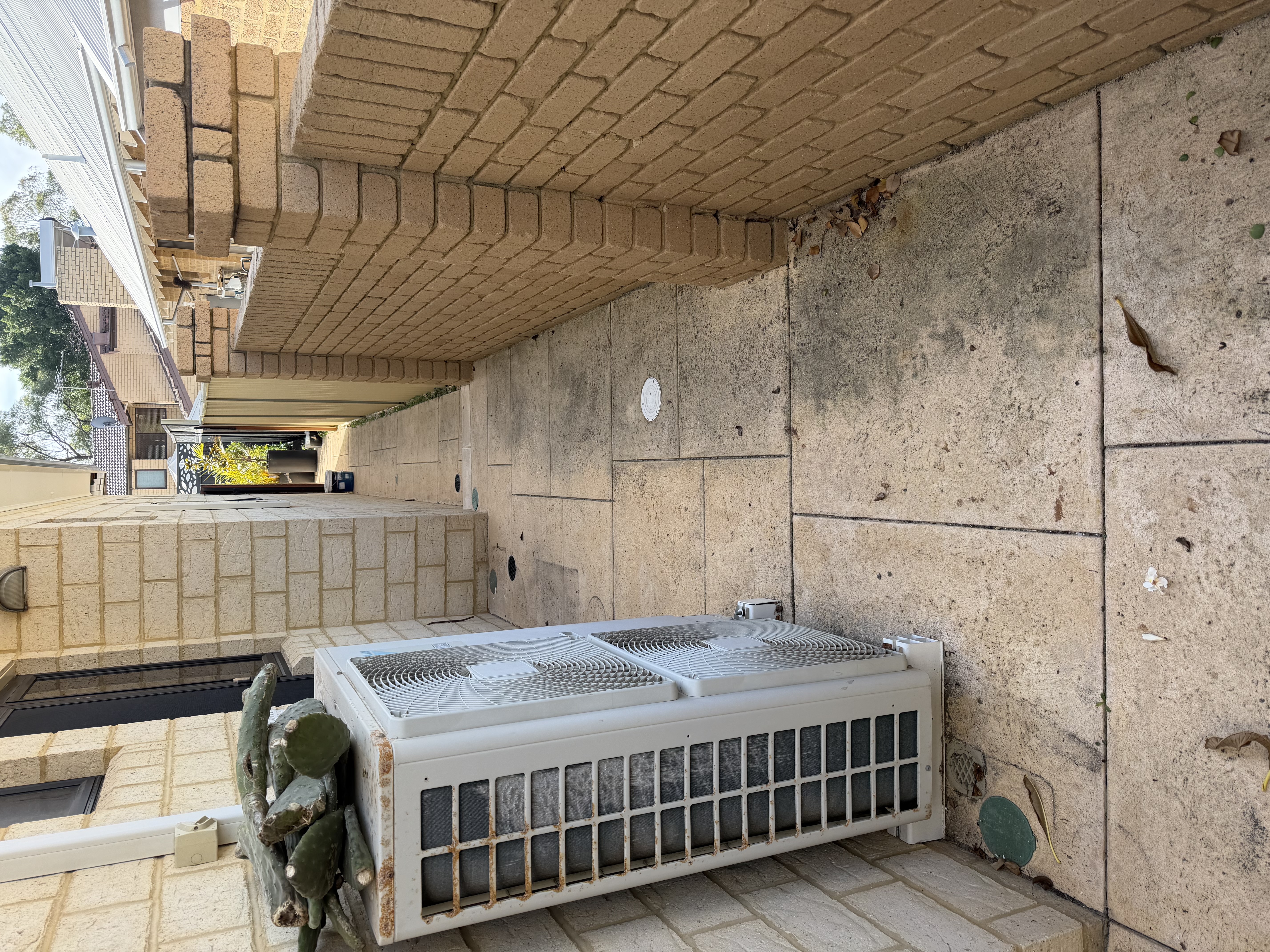 Liquid limestone Limestone tile side alley before — pressure cleaning Karrinyup Perth WA