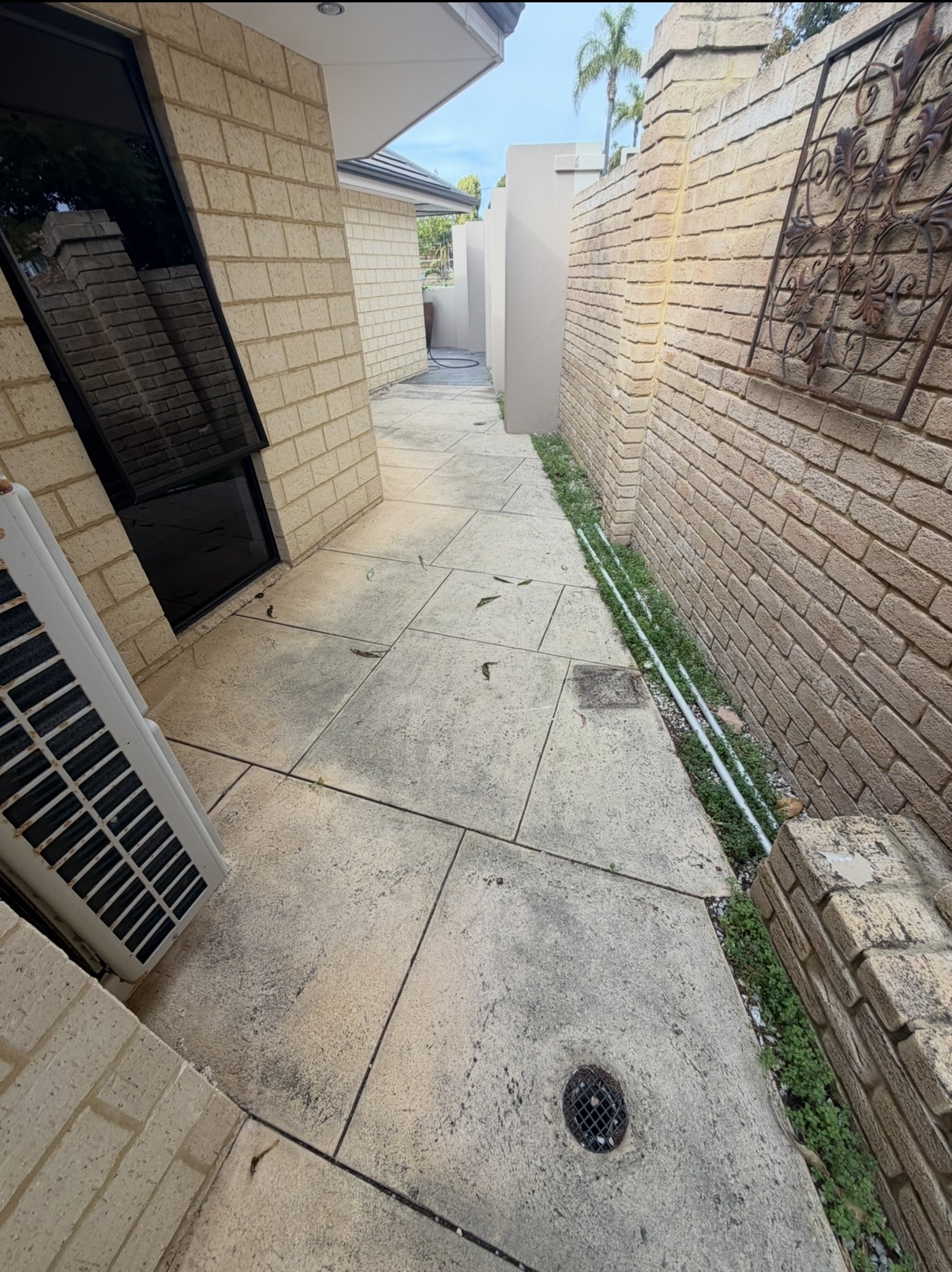 Liquid limestone Limestone tile side alley after — pressure cleaning Karrinyup Perth WA
