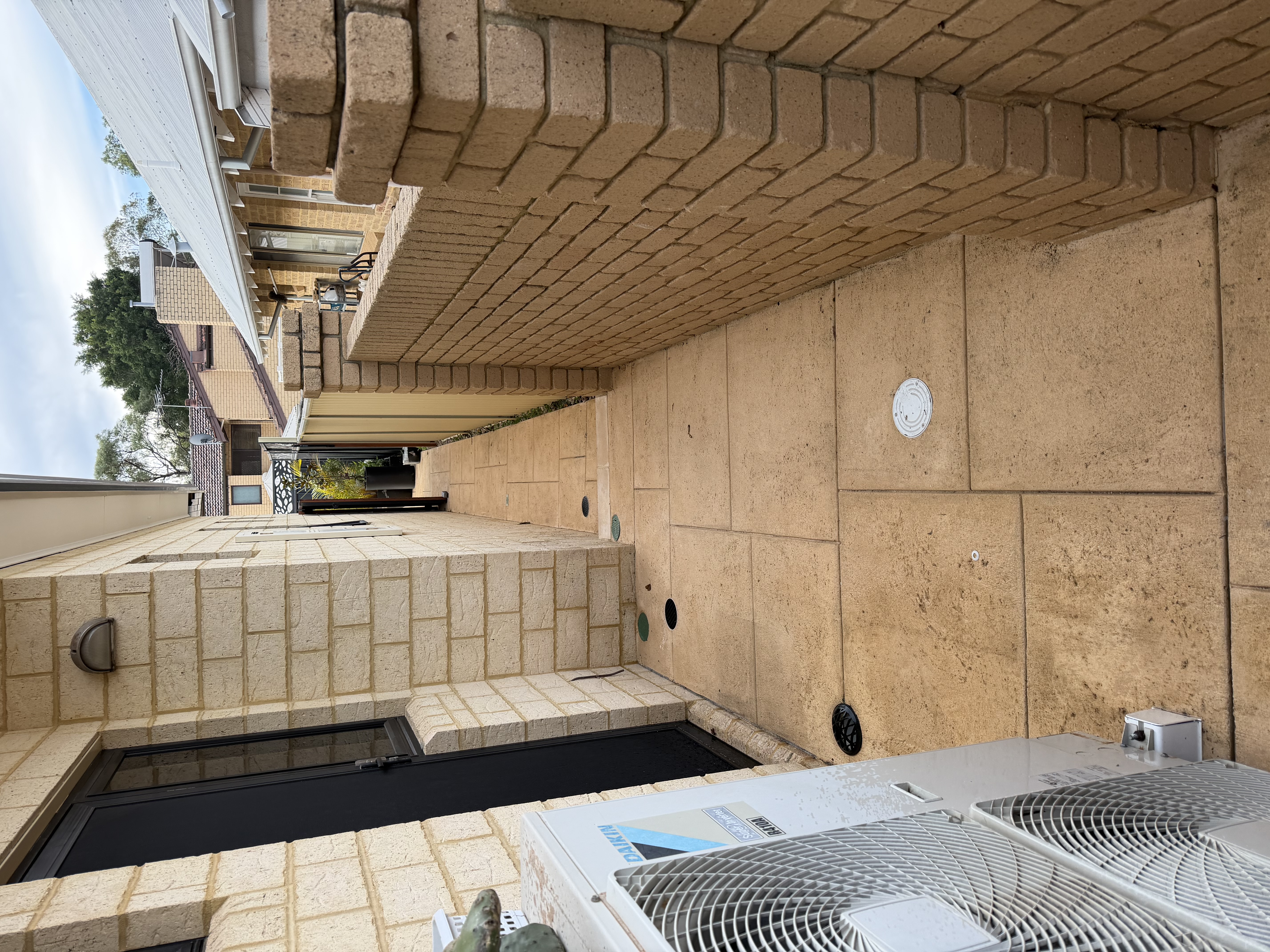 Liquid limestone Limestone tile side passage after — pressure cleaning Karrinyup Perth WA