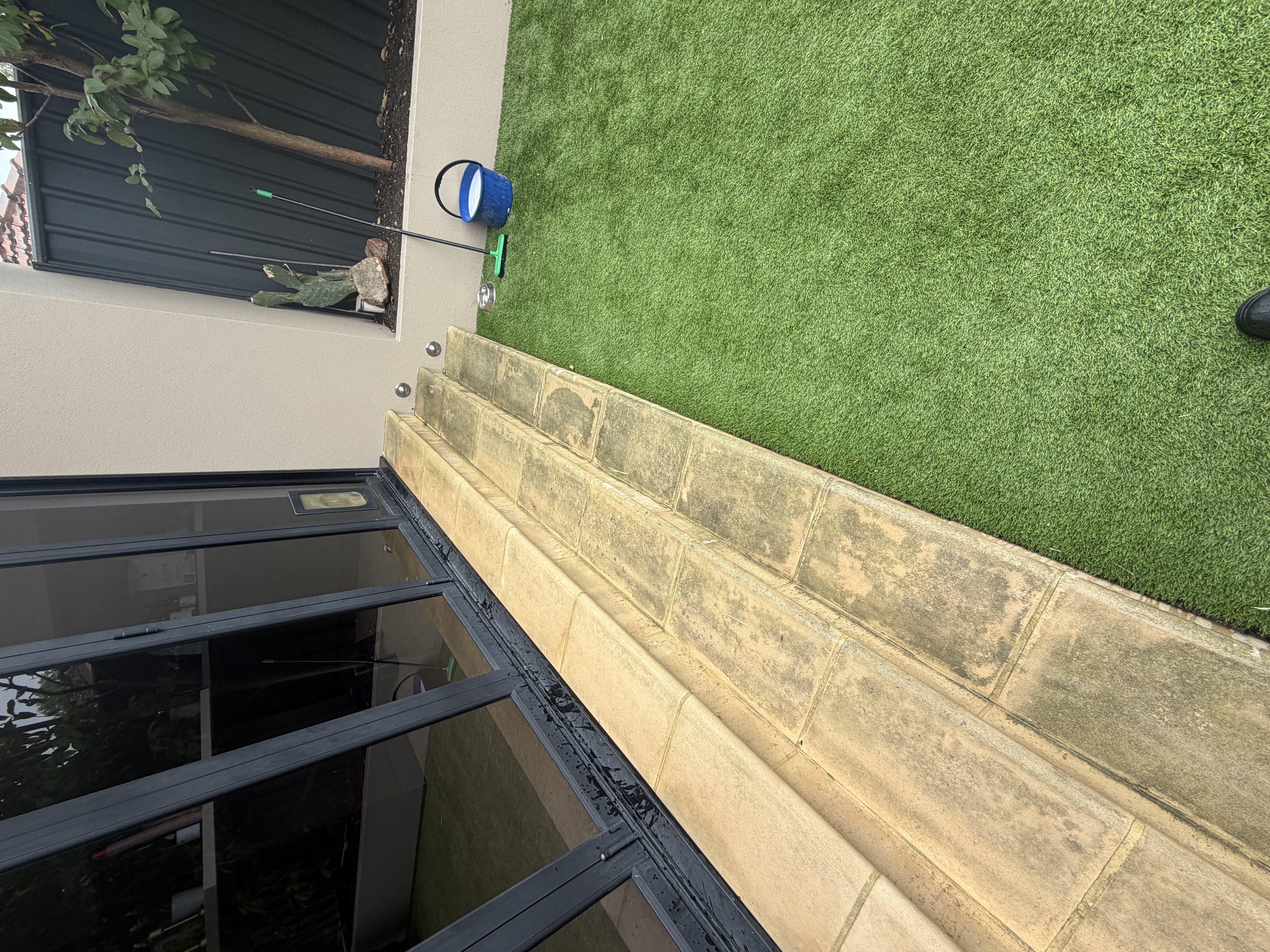 Limestone pavers Sandstone patio step edge before — pressure cleaning North Beach Perth WA